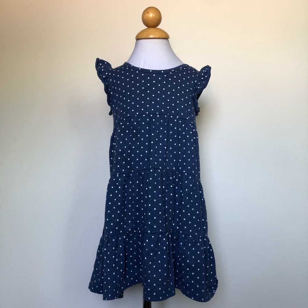 The children place polka dot dress